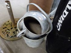 Galvanised watering can and a galvanised bucket