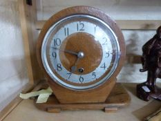 Art Deco style mantel clock in oak veneered case