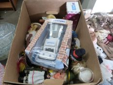 Box of various costume dolls, a Confused.com robot etc