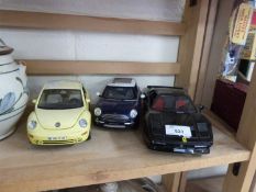 Group of three model cars