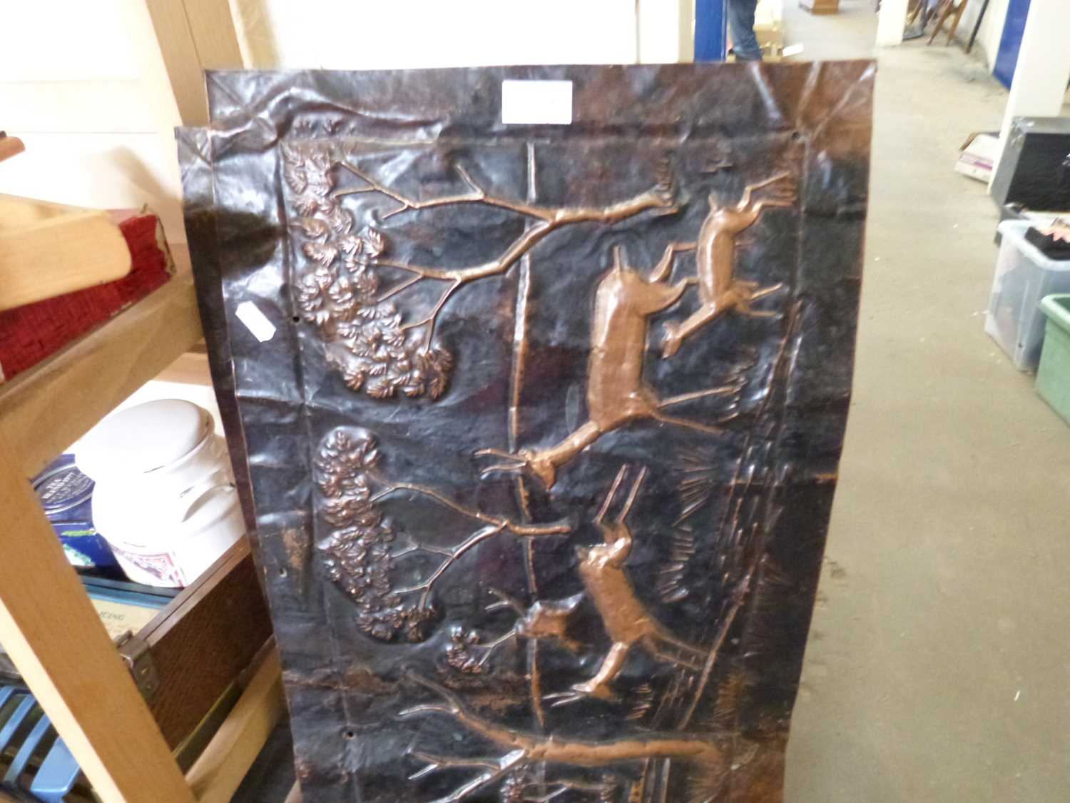 Two copper panels decorated with deer