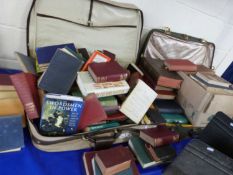 Two suitcases various assorted books