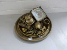 Mixed Lot: Brass serving trays and various assorted brass ornaments, camel bell etc and a mantel