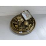 Mixed Lot: Brass serving trays and various assorted brass ornaments, camel bell etc and a mantel