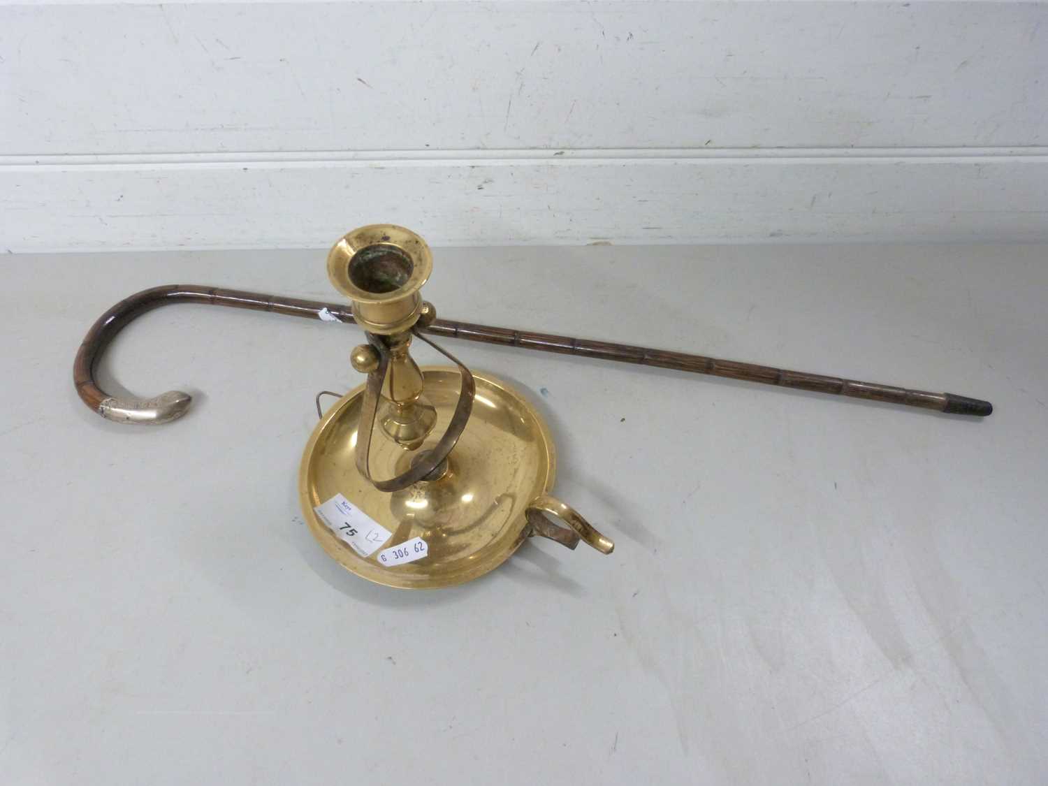 Brass boat chamber stick with suspension support together with a small white metal mounted cane (2)