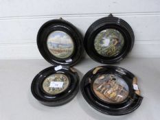 Four Pratt ware pot lids in ebonised frames