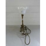 Brass stirrup type table lamp with frilled glass shade