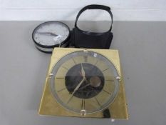 Mixed Lot: Two retro wall clocks and a head mounted magnifier