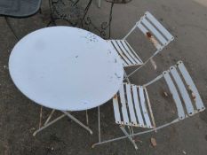 White finish metal garden table and two chairs