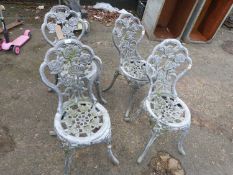 Set of four cast aluminium garden chairs