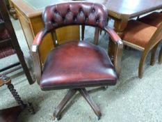 Red leather upholstered captains chair