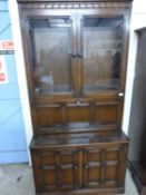 Dark ercol lounge cabinet with drop down drinks centre