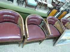 Set of four bow back bamboo effect chairs