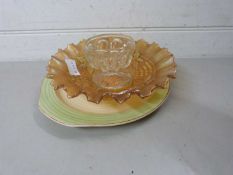 Clarice Cliff Newport Pottery plate together with a Carnival glass dish and one other (3)