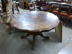 Reproduction continental inlaid dining table decorated with floral detail raised on four outswept