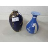 George Jones crescent ware vase decorated with fish together with a further Jasper style vase