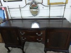 Large Edwardian mahogany bow front sideboard on ball and claw feet, 182cm wide