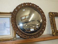 Circular convex wall mirror in gilt finish frame