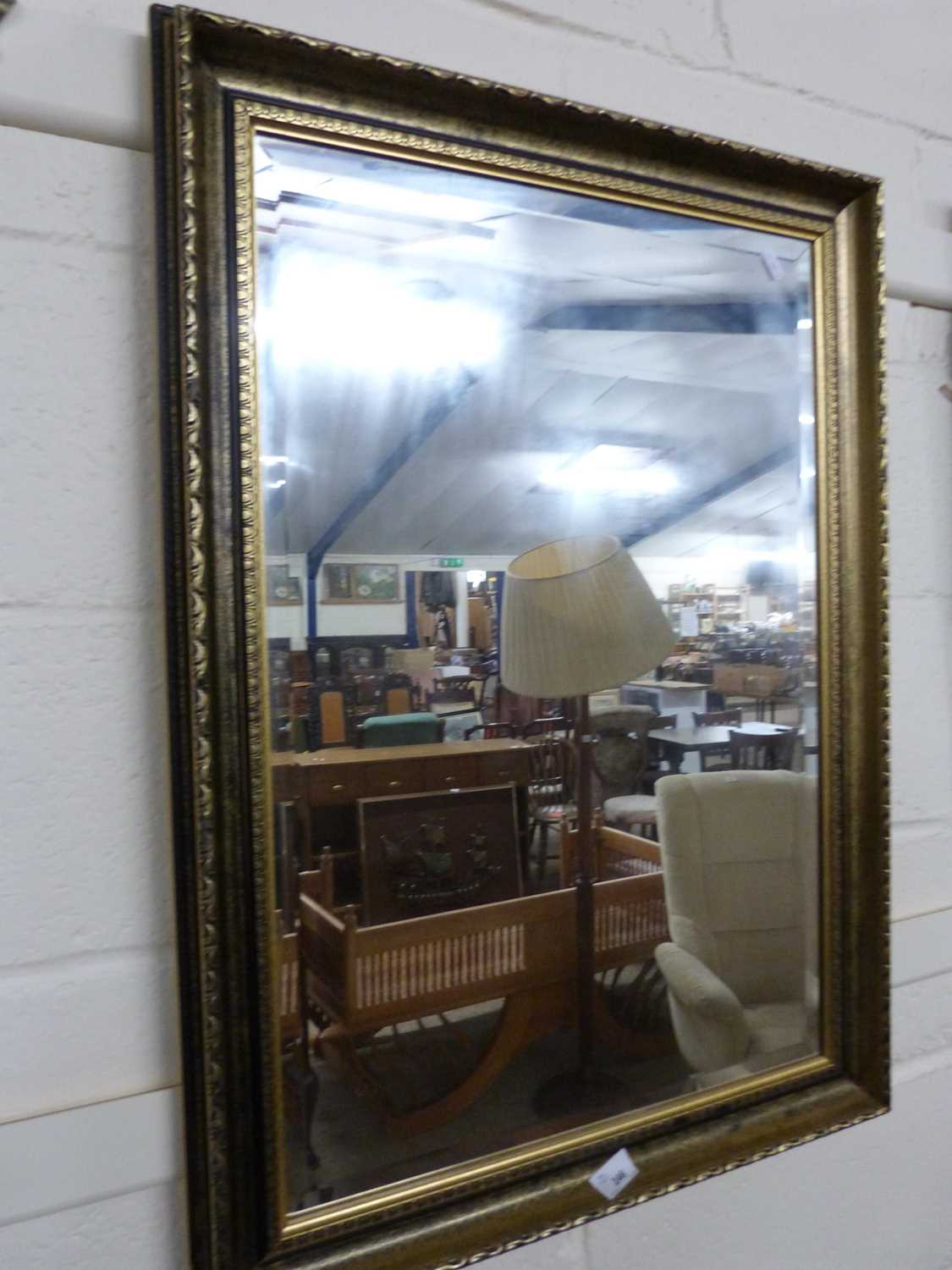 Rectangular bevelled wall mirror in gilt finish frame