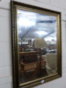 Rectangular bevelled wall mirror in gilt finish frame