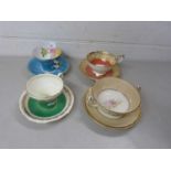 Group of three Aynsley cups and saucers together with a Royal Doulton cup and saucer