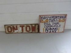 Vintage metal sign "On Tow" together with a further metal sign from a fairground