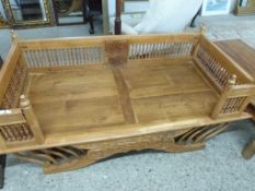 Modern Indian hardwood day bed with spindle turned sides and carved floral detaill, 146cm