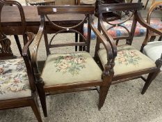 Pair of 19th Century mahogany carver chairs with X formed backs and tapestry seats