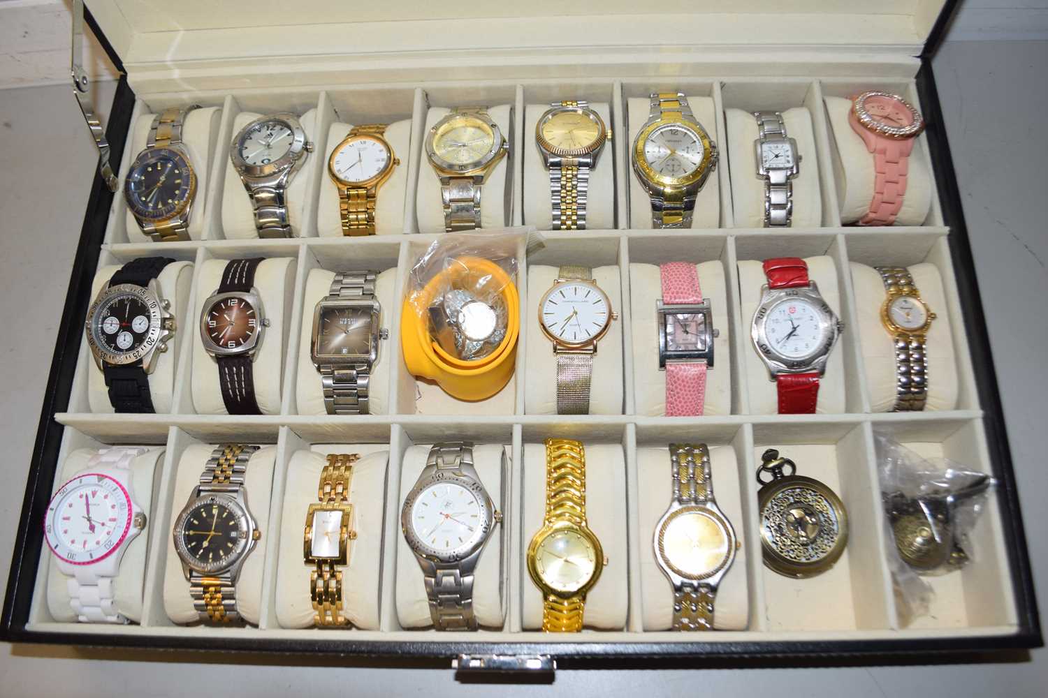 A display case of modern wristwatches - Image 2 of 2