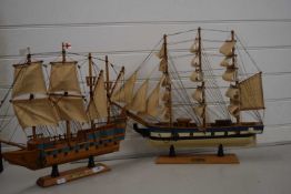 Two model tall ships HMS Ark Royal and Constitution