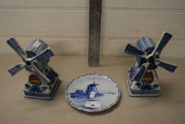 Two Dutch novelty windmill shaped delft spirit bottles plus a further similar plate (3)