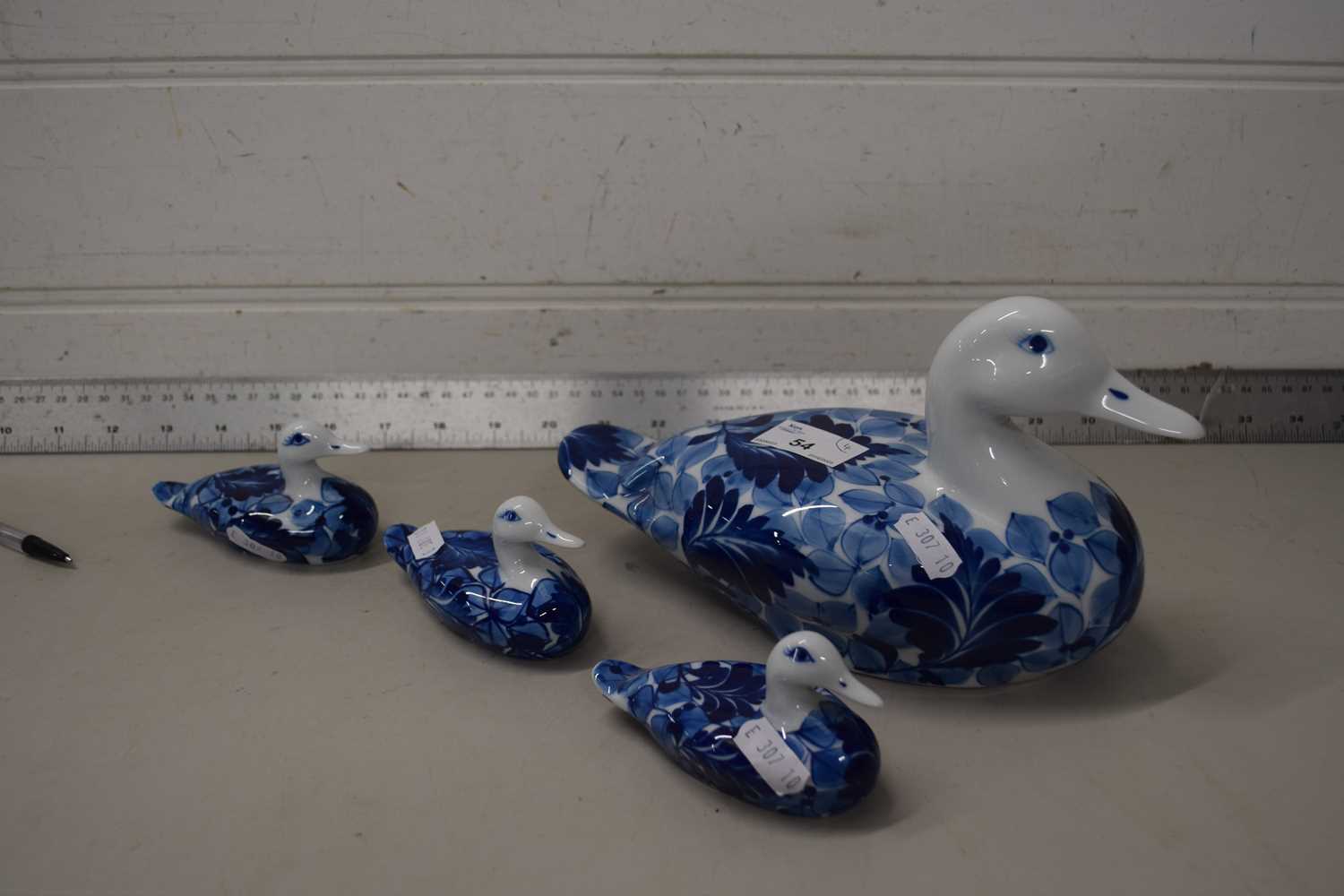 Four modern pottery ducks