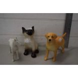 A Beswick model labrador together with a Winstanley Pottery cat and a further model horse (3)