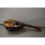 Vintage mother of pearl inlaid mandolin labelled to the interior H Globo