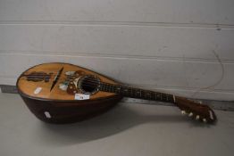 Vintage mother of pearl inlaid mandolin labelled to the interior H Globo