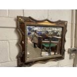 Rectangular bevelled wall mirror set in a rope finish gilt frame