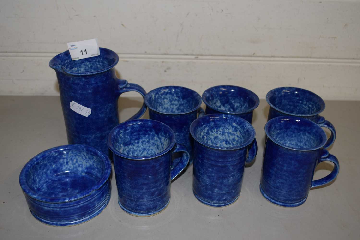 Quantity of blue mottled glazed tea wares