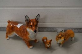 Royal Doulton model corgi together with two other smaller