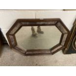 Octagonal framed mirror with bevelled edges