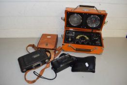 Spirit of St Louis radio alarm clock together with a vintage Kodak camera and one other