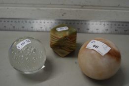 Three various assorted paperweights