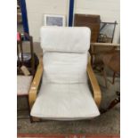 Modern light wood framed armchair