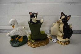 Two cast iron painted door stops formed as cats together with another formed as ducks (3)