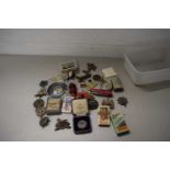 Box of mixed items to include various cigarette cards, cap badges, pocket knife etc