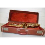 Cased brass saxophone No makers name apparent Non matching mouthpiece Very worn and scuffed