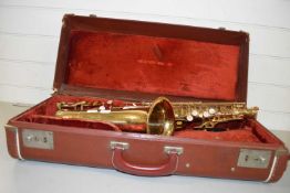 Cased brass saxophone No makers name apparent Non matching mouthpiece Very worn and scuffed