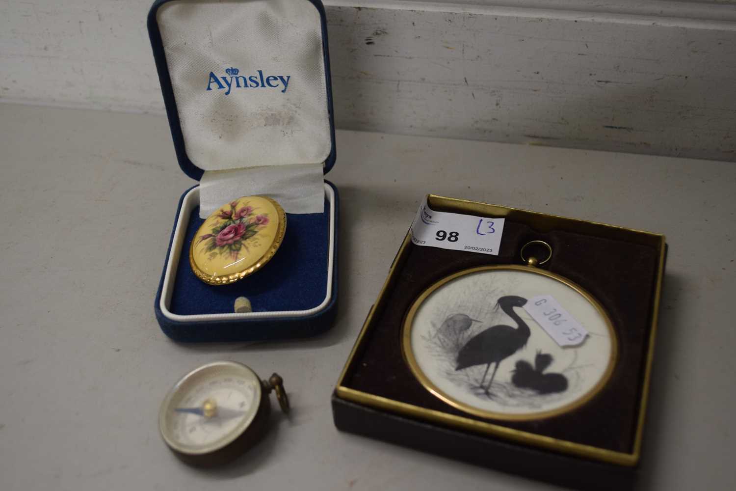 Mixed Lot: Small compass, floral Aynsley brooch and a small sillouhette picture of herons