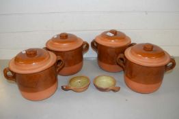 Four brown glazed kitchen pots and two further smaller dishes (6)