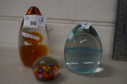 Three various assorted paperweights