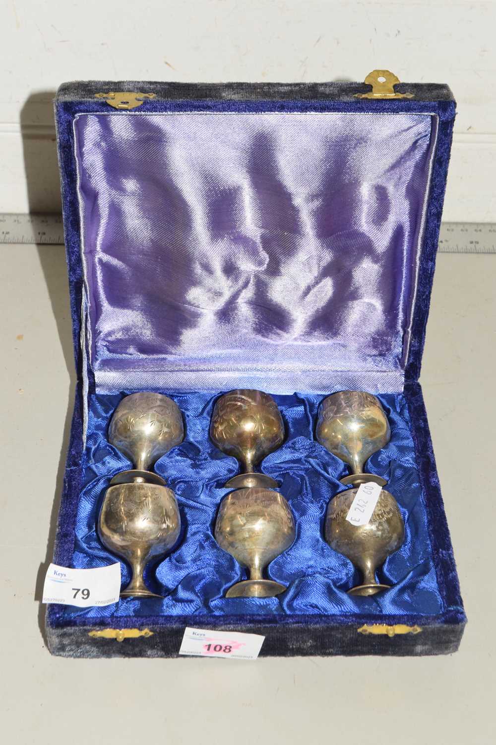 A cased set of silver plated goblets